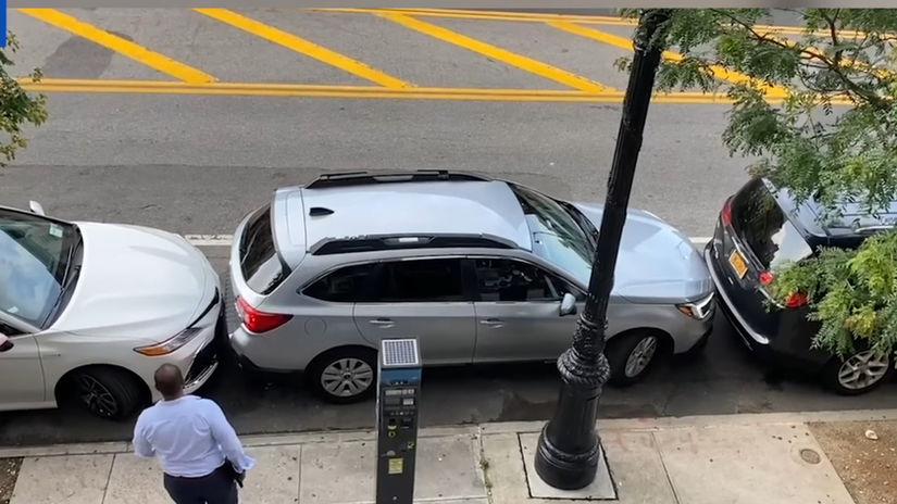 New York driver pulls out of incredibly tight parking spot | Daily Mail